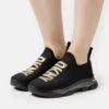 DKNY TambreSlip On- Sneakers Laag - Black -Mode Kledingwinkel 120bf2cdb5ef4529beeeb0a6d20f71ac