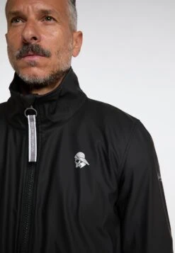 Schmuddelwedda Grassland - Regenjas - Schwarz -Mode Kledingwinkel c0648674056a4cc6bcefb80c2e17cc71