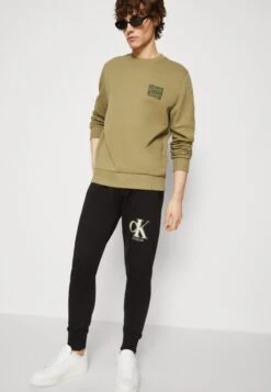 Calvin Klein Jeans Spray Pant - Trainingsbroek - Black -Mode Kledingwinkel db97a8e41e094e20bf9097ea017aff3b