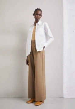 Nieuwe uitgaven -Mode Kledingwinkel ec0a3f79844549cbba7beb75b22cf3f3